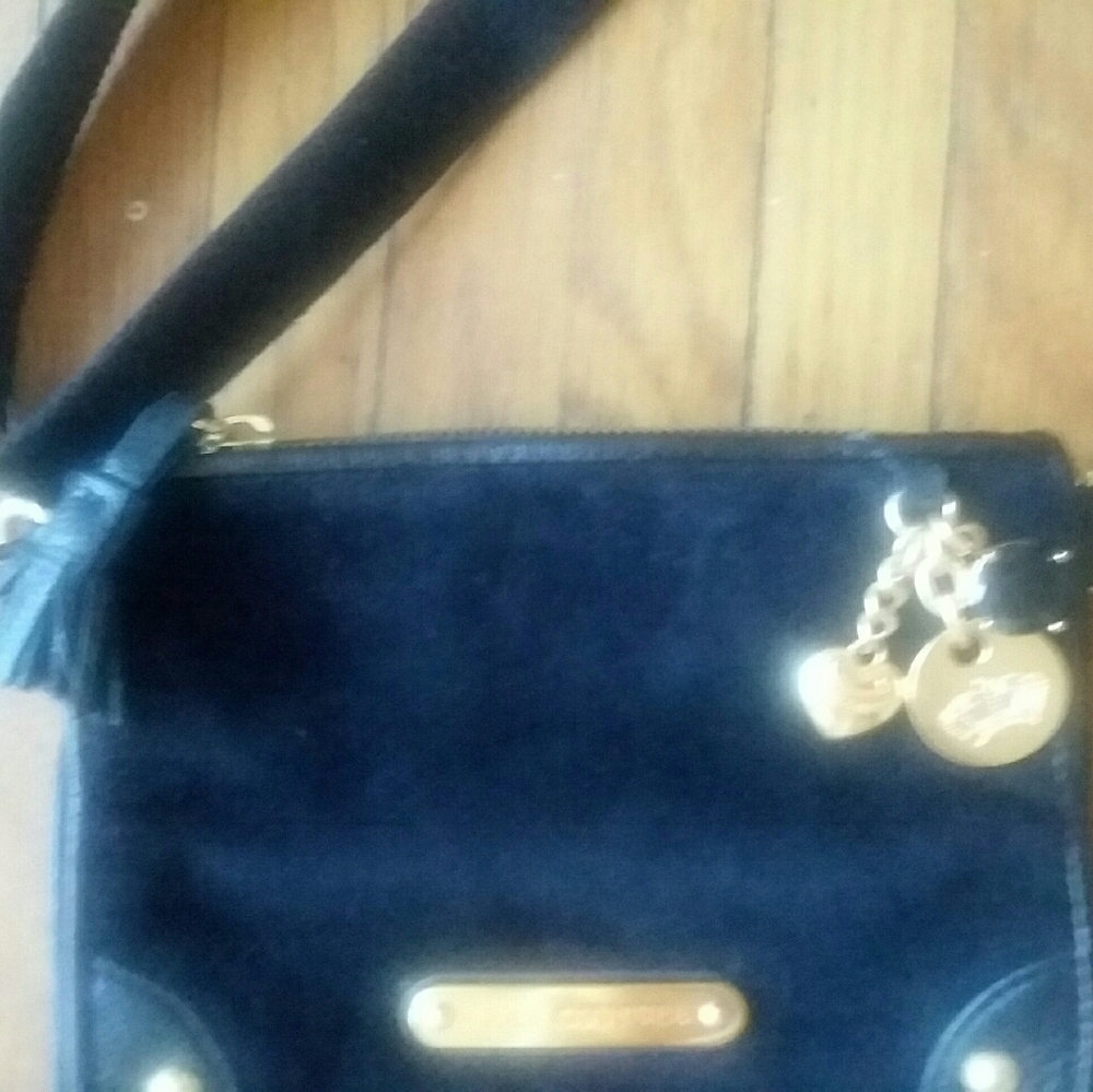 Juicy Couture Black satchel!!!!!!! Poka-Dot Interior soft material
ITEM #1 - Picture 13 of 16